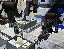 Robots in automated packaging work 