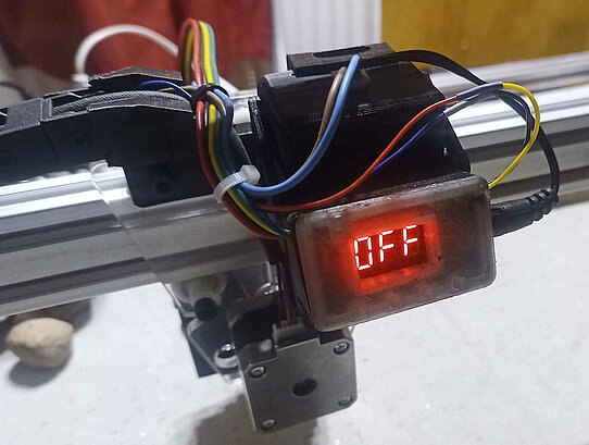 Originally mounted laser power supply and driver, in the OFF status, in red luminous digits