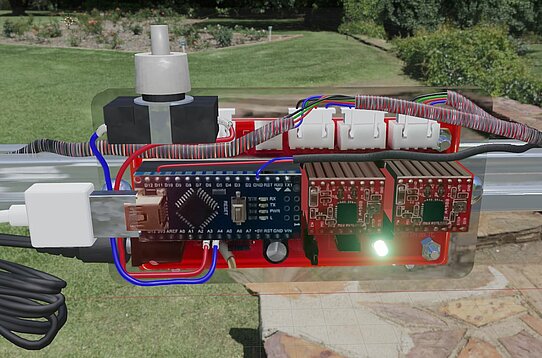 Image of wired control unit drawn with Blender, with natural landscape as background